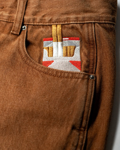 WASHED BROWN JEANS®